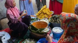 Nurjanah penjual bubur roomo (foto: Daniel Andayawan)