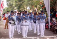 Peserta gerak jalan Wadeng Sidayu 2025 PKK Kauman  Sidayu mendapat juara 1.
