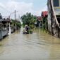 Banjir Menganti merendam ratusan rumah dan fasilitas umum. Tanggul di Kedamean juga jebol. BPBD lakukan pemompaan dan pendirian dapur umum.